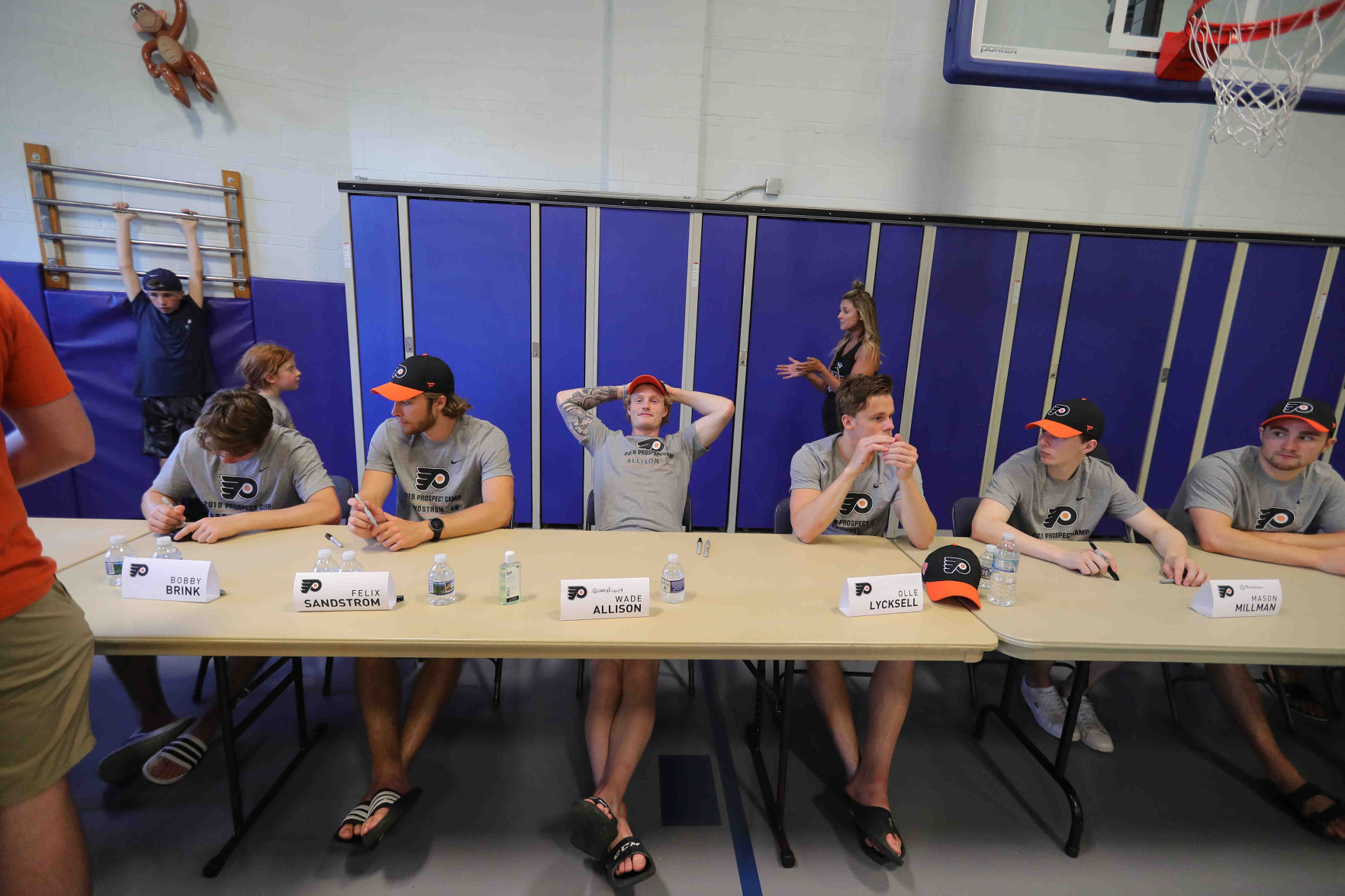 Philadelphia Flyers prospects sign autographs and play volleyball
